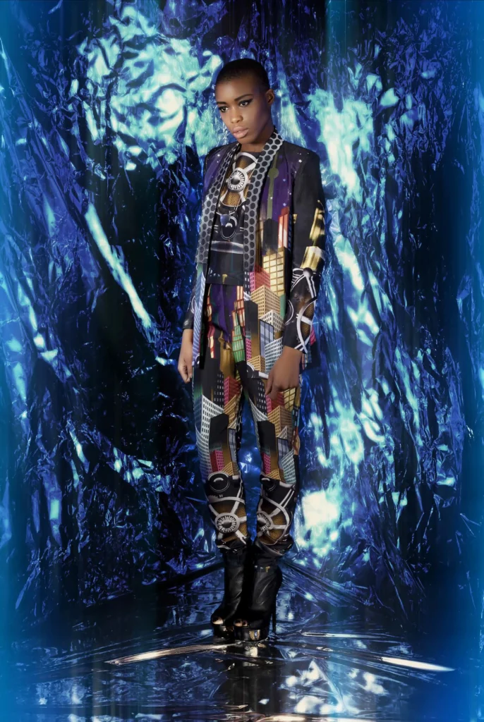 A printed pant suit inspired by futuristic skyscrapers, featuring architectural silhouettes and geometric patterns, blending modern tailoring with sci-fi aesthetics.